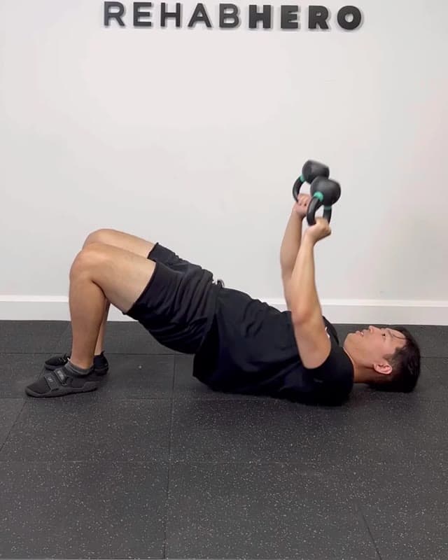 Bottoms Up Kettlebell Bridge Press