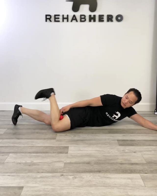 Ball Squeeze Prone Hip Extension