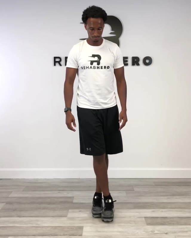 Bent Over Cross Leg Stretch