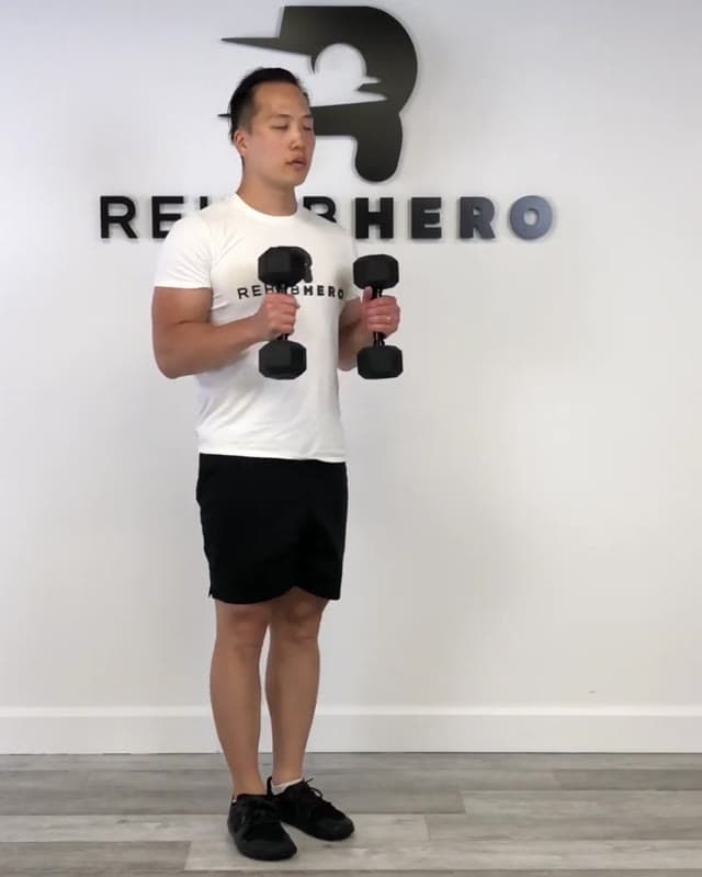 哑铃出拳——强化肩部与肱二头肌