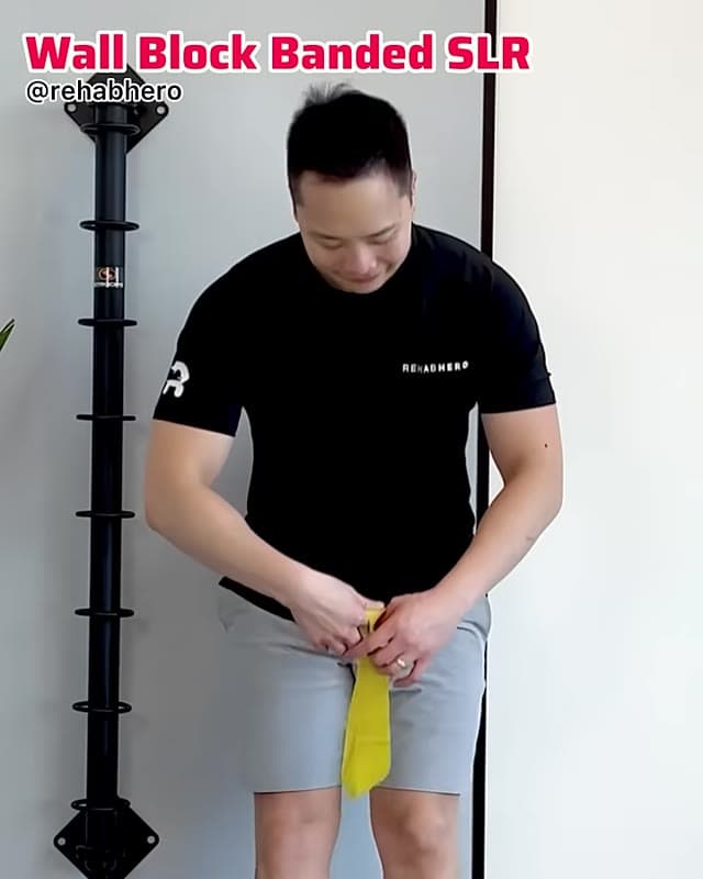 Wall Block Banded Straight Leg Raise