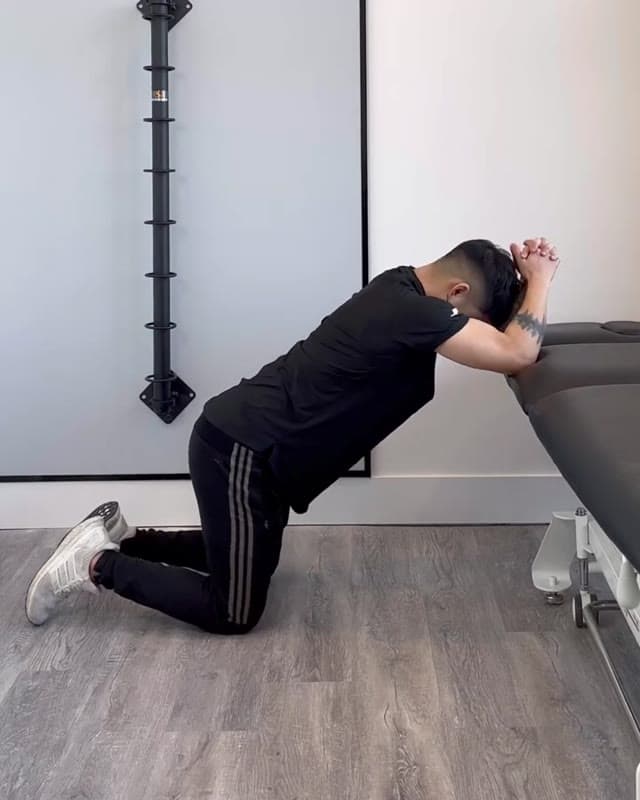 Lay Box Stretch - loosen up your Latissimus Dorsi muscle and increase your shoulder range of motion