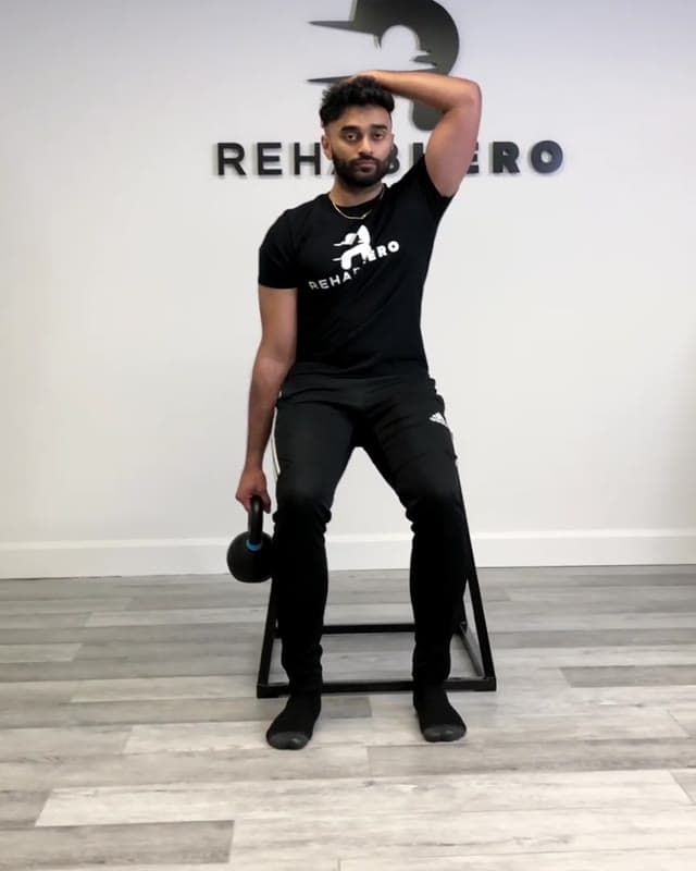 Weight Assisted Neck Stretch