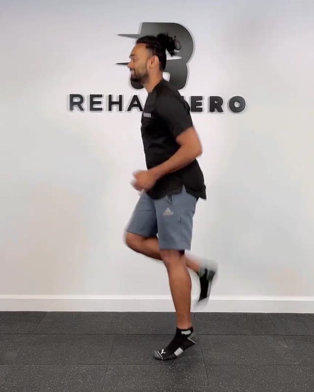 Alternating Butt Kicks - Running warm up drill