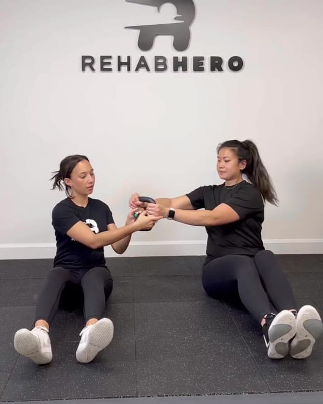 Partner Russian Twist - try these core exercises with a friend or family!