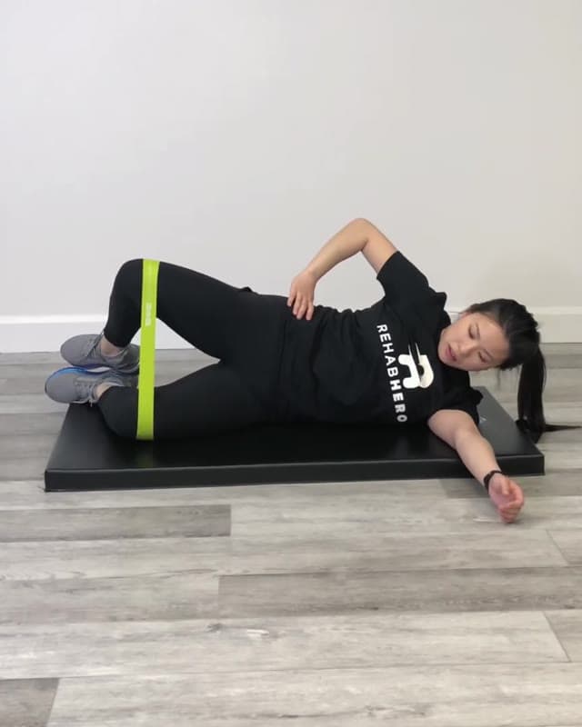 Target your outer hip muscles with the Banded Clamshells