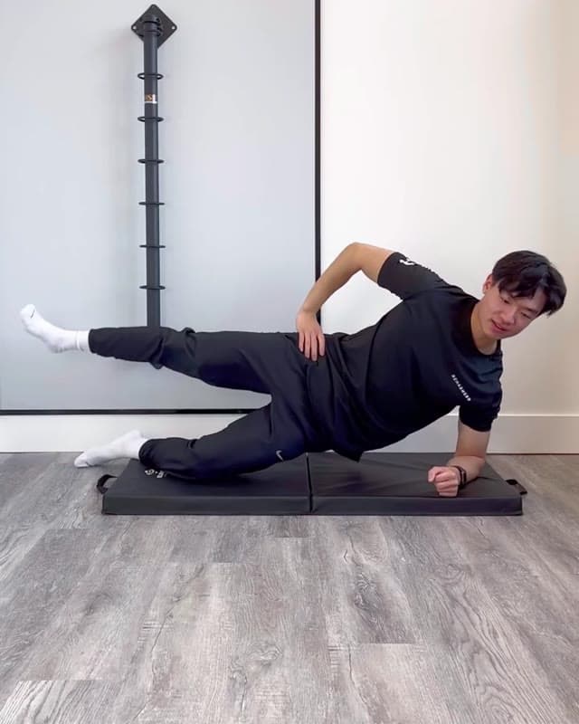 Side Plank Leg Lift - oblique strengthening and hip abduction strengthening exercise